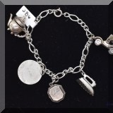 J086. Sterling silver Danecraft charm bracelet. 7” - $42 